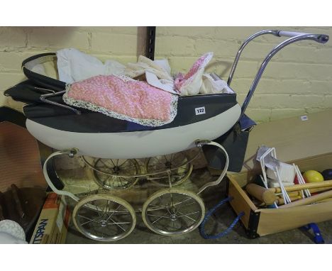A Vintage Dolls Pram by Tri-Ang, 74cm high 