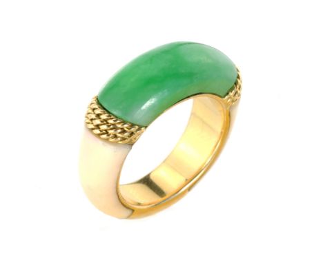 AN ANTIQUE JADEITE JADE AND IVORY DRESS RING, BOUCHERON set with a central carved piece of jade flanked by ropetwist accents,