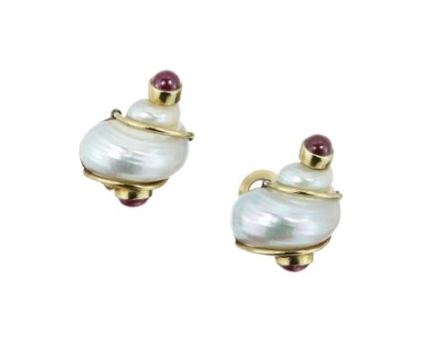 A PAIR OF TURBO SHELL AND RUBY CLIP EARRINGS, SEAMAN SCHEPPS in 14ct yellow gold, each designed with an iridescent turbo shel
