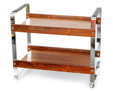 Merrow Associates - A 1970s rosewood veneered two tier serving trolley, with chromium plated flattened steel frame with leath