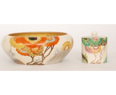 Clarice Cliff - Aurea - A cylindrical drum preserve circa 1934 hand painted with a stylised tree landscape in tonal pink and 
