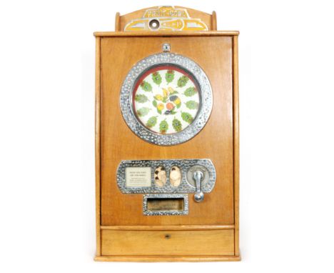 Bryans Automatic Machine Works - A 1950s Bryans 'Fruit Bowl' 1d coin operated counter top penny slot machine, contained in a 