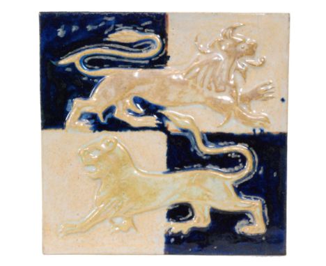 William de Morgan - Sands End - A 6in plastic clay tile decorated in the Raised Lion pattern with a relief moulded lion and l