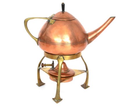 Wurttembergische Metallwarenfabrik (WMF) - A brass and copper spirit kettle, brass tripod stand supporting copper burner and 