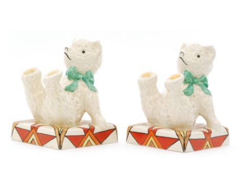 Clarice Cliff - Teddy Bear - Sunburst - A pair of novelty bookends circa 1930 modelled as two seated bears wearing ribbon col