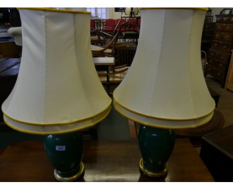 A pair of decorative green ceramic Chinese style table lamps, with silk shades. (sold electrically untested).