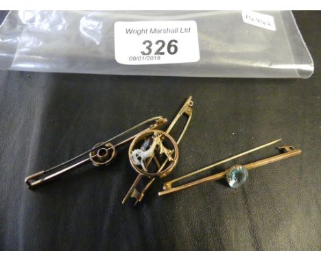 Three gem-set bar brooches, in rose-metal, together with an enamel bird brooch, gross weight combined approx. 8.9g (4)
