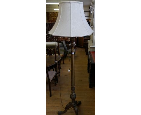 A 20th Century gilt wood standard lamp on tripod base 