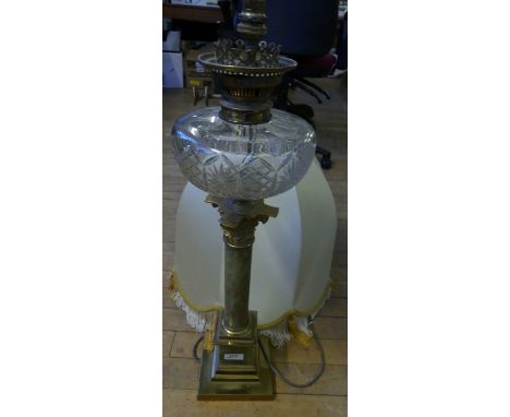 A 20th Century electric table lamp, the column base formed of polished onyx and brass. (sold electrically untested)