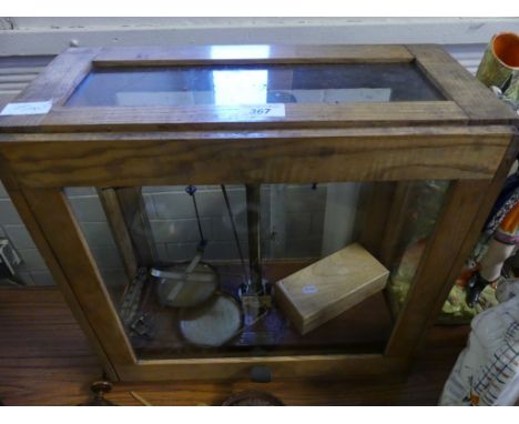 A cased set of Chemist precision scales and weights.