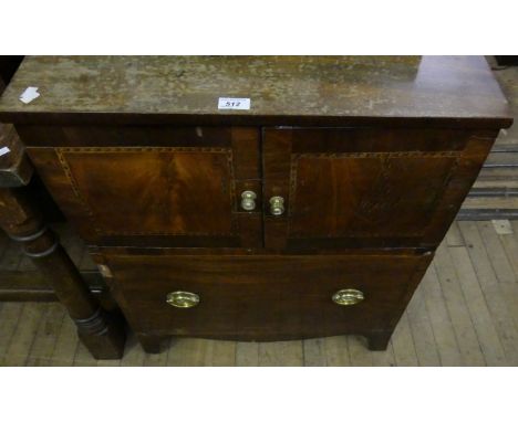 A late Georgian inlaid mahogany commode chest of drawers.