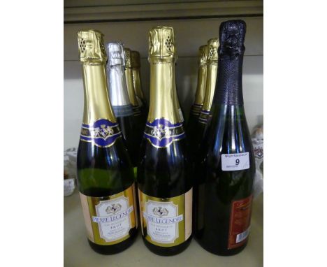 Twelve bottles of various sparkling wine.