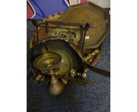 A mixed lot of assorted copper and brassware to include various trays, candlestick, frying pan, trivet and other items.