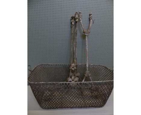 A vintage wirework cast iron children's crib 