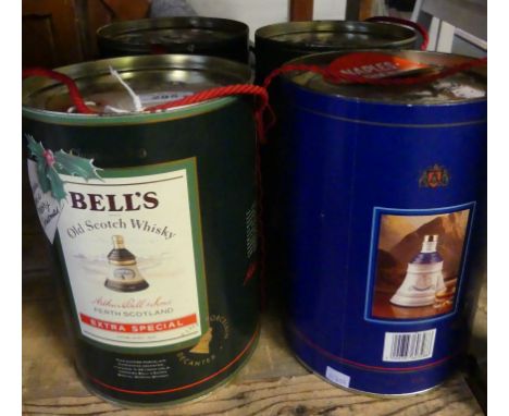 4 Bottles Bells Whisky Decanters including the rarer 1988 Christmas Decanter being 1 Christmas Decanter each of 1990, 1999 an