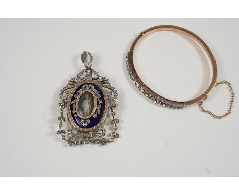 A BLUE ENAMEL AND PEARL PENDANT the central panel of blue enamel centred with an image of a cherub within a foliate surround 