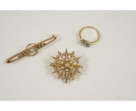 A LATE VICTORIAN STAR BURST PEARL SET PENDANT set overall with graduated half pearls, in gold, 3.5cm. dia., together with a 9