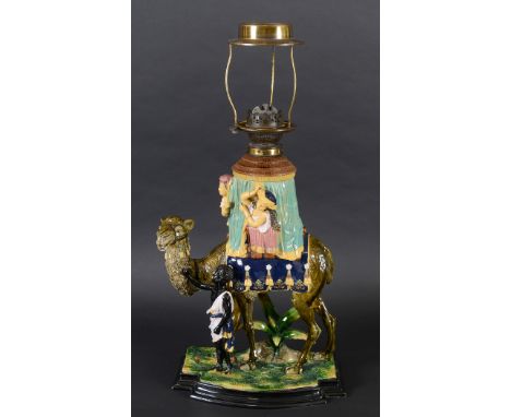 LARGE MAJOLICA OIL LAMP - WILHELM SCHILLER an interesting majolica group by Wilhelm Schiller, modelled with a Camel and a fig