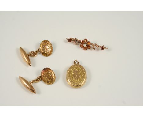 A PAIR OF 15CT. GOLD CUFFLINKS each link with foliate engraved decoration, together with an oval-shaped foliate engraved lock