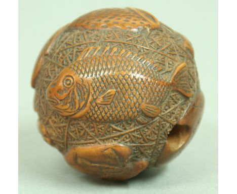 JAPANESE WOODEN NETSUKE OF MAN IN A BASKET, inset ivory plaque signed Hopee, length 3.5cm; together with another of an oni sh