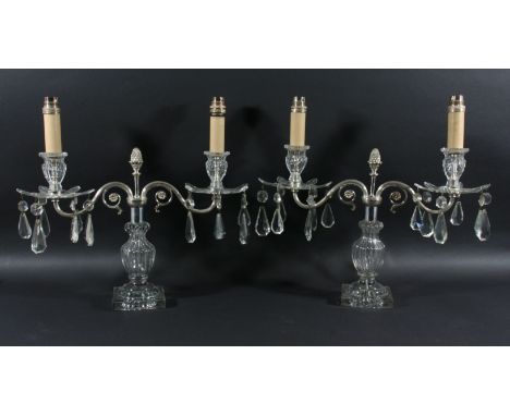 PAIR OF TWO LIGHT GLASS CANDELABRA the silver plated arms supporting floral drip trays, on reeded baluster stems and lemon sq