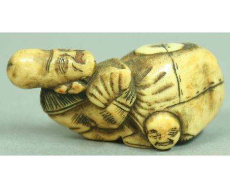 JAPANESE IVORY NETSUKE OF A SEATED MAN, signed, height 4cm; together with another of a man standing and a third, probably bon