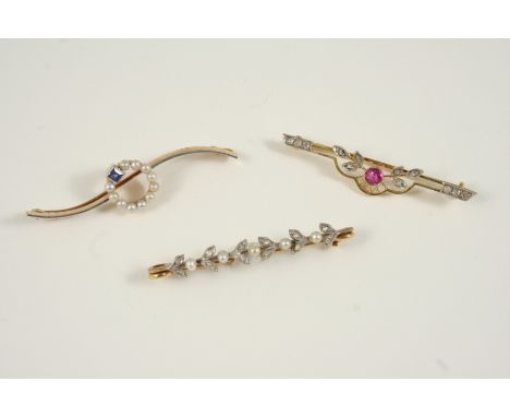 A DIAMOND AND PEARL FOLIATE BROOCH set with rose-cut diamonds and small pearls, in gold, 4.5cm. long, together with two other