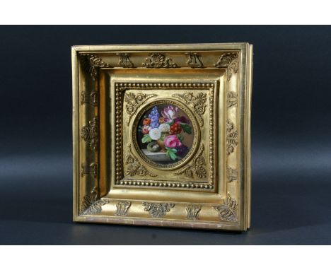 ENGLISH PORCELAIN PLAQUE, early 19th century, painted in the manner of Thomas Steele with a vase of flowers and a bird's nest