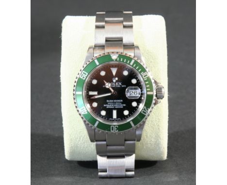 A GENTLEMAN’S STAINLESS STEEL 50th ANNIVERSARY 2005 SUBMARINER OYSTER PERPETUAL DATE WRISTWATCH BY ROLEX the signed black dia