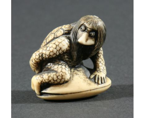 TWO JAPANESE NETSUKE, the first modelled as a figure half man and half turtle on a clam shell, signed, 3.7cm and the other ca