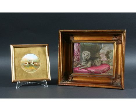 ROYAL WORCESTER PLAQUE, signed, date code for 1932, painted with a pair of hunting hounds, puce printed mark, diameter 6.5cm;