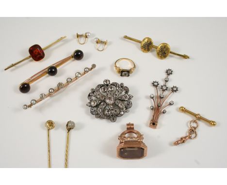 A QUANTITY OF JEWELLERY including a diamond and half pearl brooch, set in gold, a gold brooch set with garnet cabochons, a go
