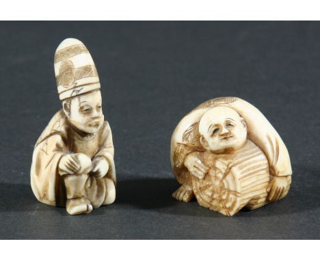 FIVE JAPANESE NETSUKE, the first of a man trying to lift a tree trunk and four other figures, tallest 4.5cm (5)