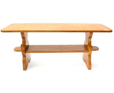 A Thomas ''Gnomeman'' Whittaker Oak Rectangular Coffee Table, with undertier shelf, on two shaped supports, with recessed car