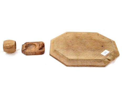 A Robert ''Mouseman'' Thompson Oak Bread Board, with carved mouse signature, 31cm; A Robert ''Mouseman'' Thompson Oak Ashtray