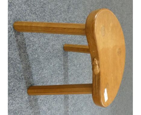 A Robert ''Mouseman'' Thompson Oak Cow Stool, on three octagonal legs, with carved mouse signature, 35.5cm 