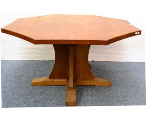 A Robert ''Mouseman'' Thompson Oak 4'6'' Octagonal Dining Table, on cruciform base, with carved mouse signature, 73.5cm high 