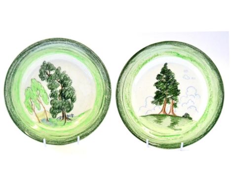 Two Clarice Cliff Bizarre ''Crayon Scenes'' Plates, decorated with tree landscapes, printed and impressed marks, 23cm  Produc