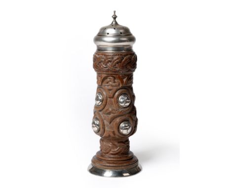 An Art and Crafts Carved Oak and Silver Mounted Sugar Caster, carved with Celtic designs and mounted with silver stylised ros