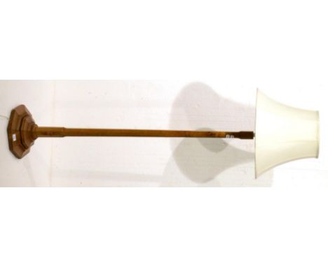 A Colin ''Beaverman'' Almack Oak Standard Lamp, octagonal column on a stepped octagonal base, with carved beaver signature, 1