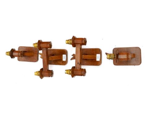 A Pair of Wilf ''Squirrelman'' Hutchinson Double Light Wall Brackets, each with carved squirrel signature, 20cm; and A Pair o