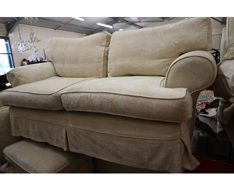 A large Multiyork two seater scroll arm sofa with loose, patterned cream covers, 185 cm wide x 90 cm deep to/w matching recta
