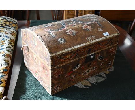 An antique dome top trunk with painted polychrome decoration, 48 cm wide x 33 cm deep x 30 cm high
