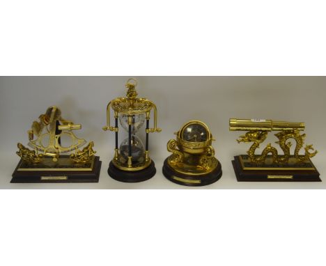 National Maritime Historical Society - a brass model, the maritime hourglass; the maritime chronometer; the spyglass; the sex