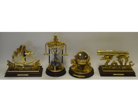 National Maritime Historical Society - a brass model, the maritime hourglass; the maritime chronometer; the spyglass; the sex