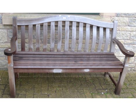 A slatted back and seat garden bench