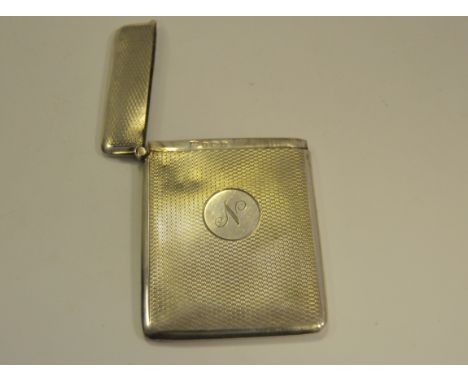 A silver , engine turned decoration , visting card case , Birmingham 1928