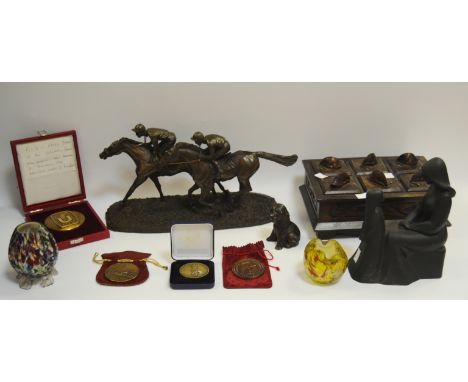 A resin model, first past the post; a Royal Doulton figure Mother and Daughter; a resin model of a puppy; a boxed University 