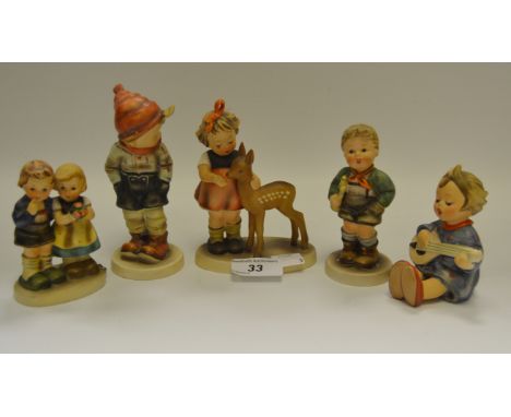 An M.J Hummel figure, Trumpet Boy; others (5)