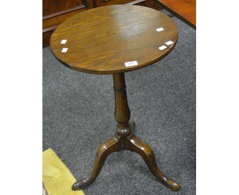 A George III style oak occasional table, circular top, turned column, tripod base, cabriole legs 
